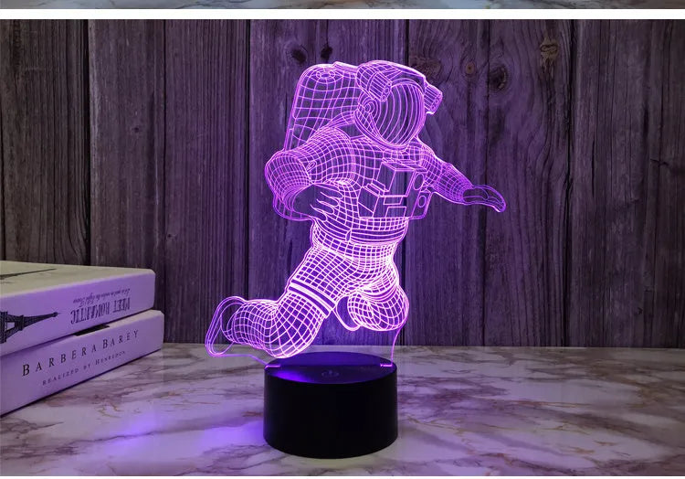 Astronaut 3D small night light with LED glowing on bedside table USB plug-in