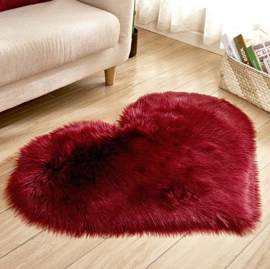 Soft and plush heart-shaped rug in various colors, perfect for cozy home decor