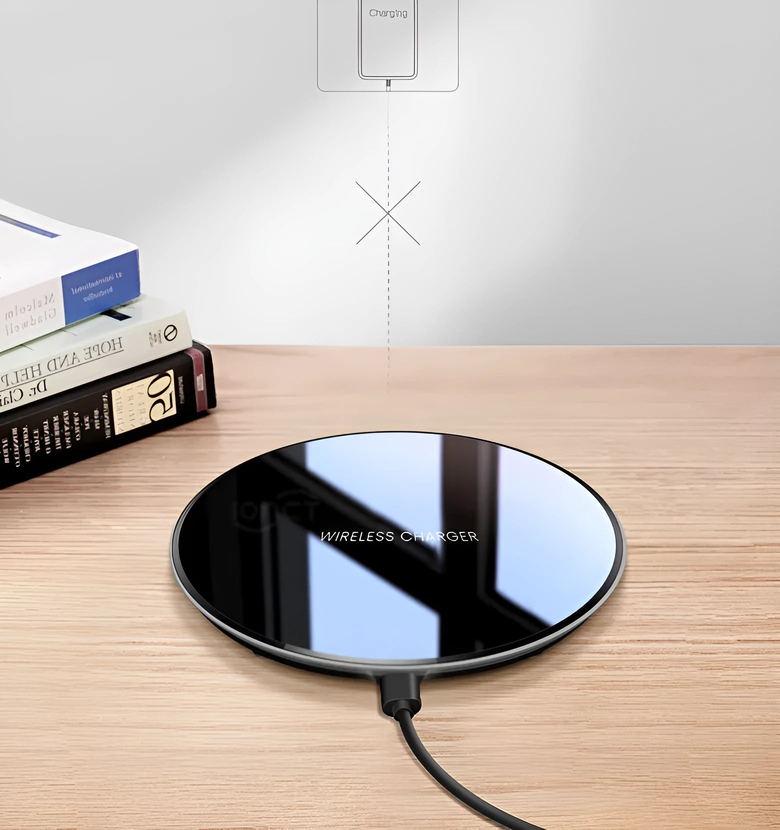 Black QI wireless charging pad with smooth plastic surface and silicone non-slip base