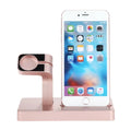 White Apple iPhone and Watch 2-in-1 charging dock station on wooden desk