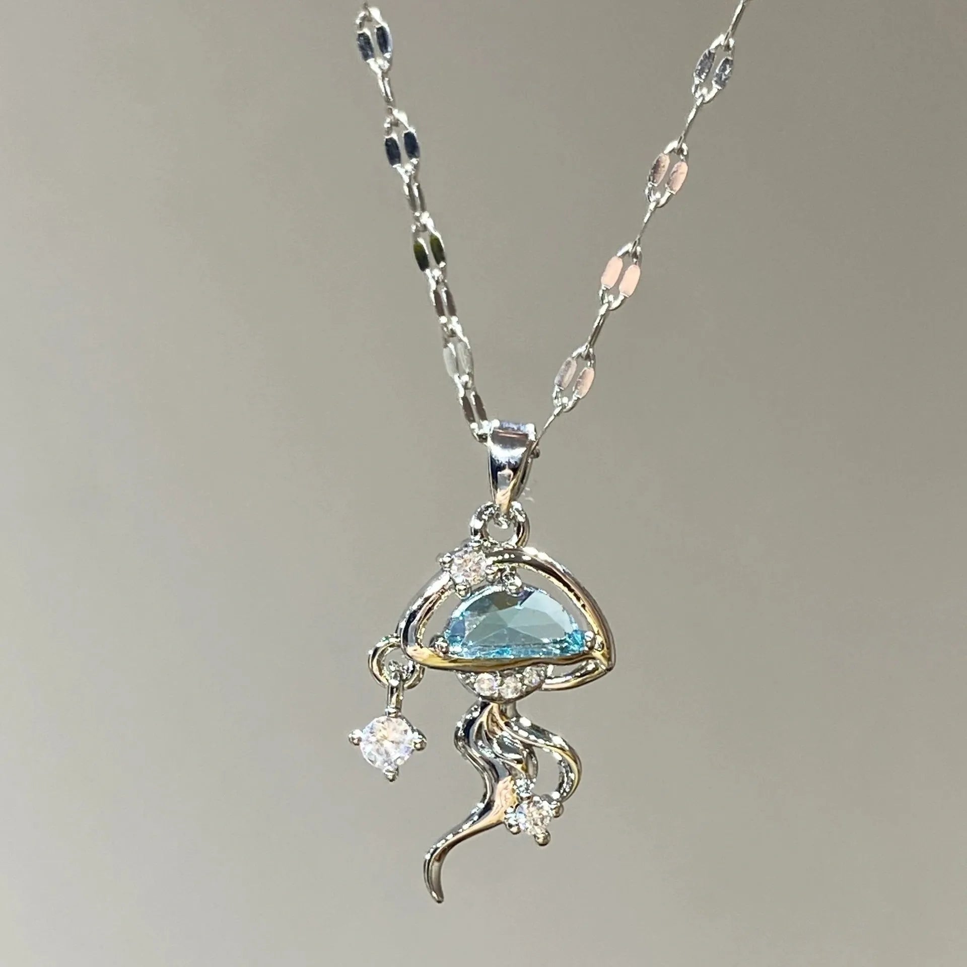 Sterling silver blue jellyfish necklace with white gold plating and adjustable chain