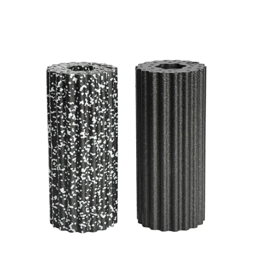 High density EPP foam roller 32 x 14 cm with quincuncial surface, shown in black and white for yoga and muscle massage.