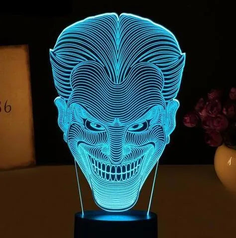 USB-powered 3D LED table lamp with remote control showing multiple colour options