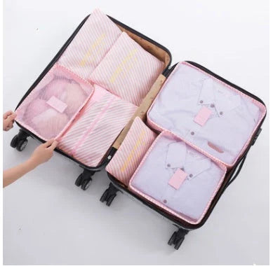 Premium waterproof travel packing cubes in various colors for organized packing and storage