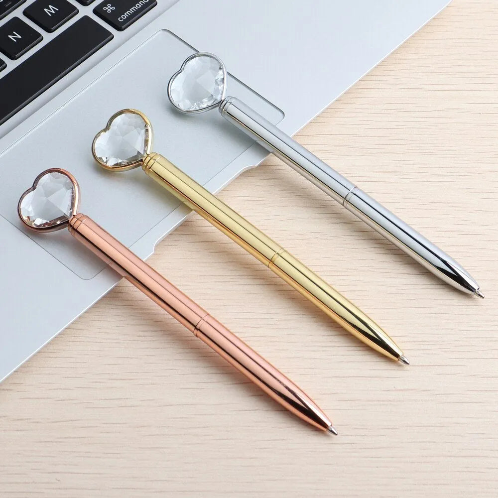 Creative Crystal Love Ball Diamond Metal Pen in gold, rose gold, and silver colours.