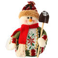 Flannel Christmas decoration figures in red, green, and white colours including snowman, elk, and old man designs