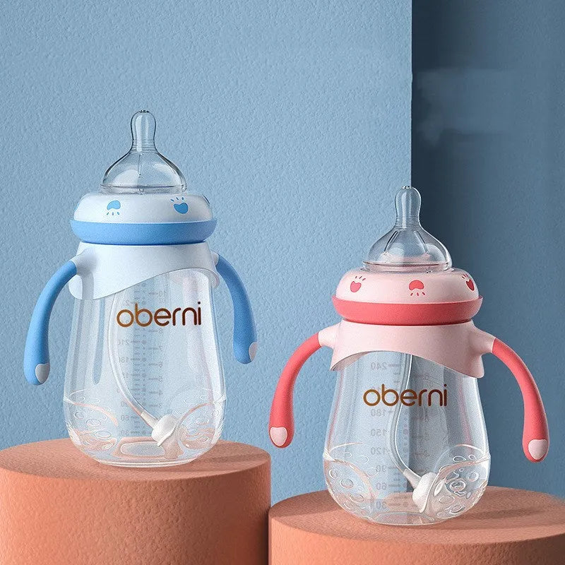 Wide caliber anti-colic baby bottle with handles in blue, green or red colours