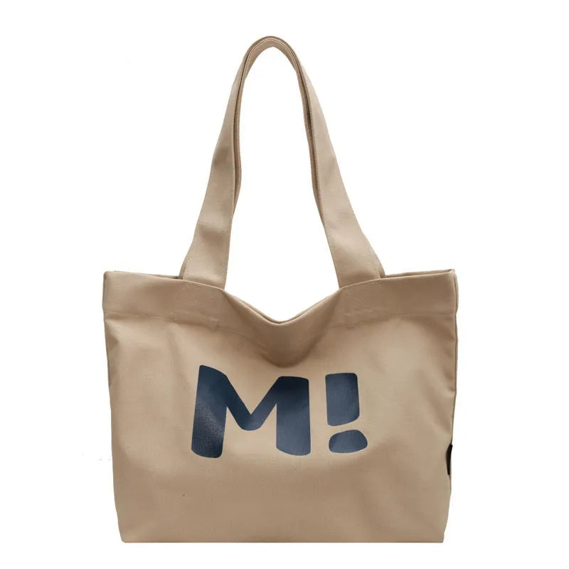 Letter print canvas shoulder bag in dark brown, large capacity tote with shoulder strap for women and girls.