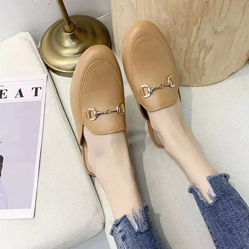 Women's PVC closed toe half slippers with buckle fastening in milky white