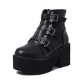 Black women's punk gothic ankle boots with bat buckle, side zip, and thick heel.