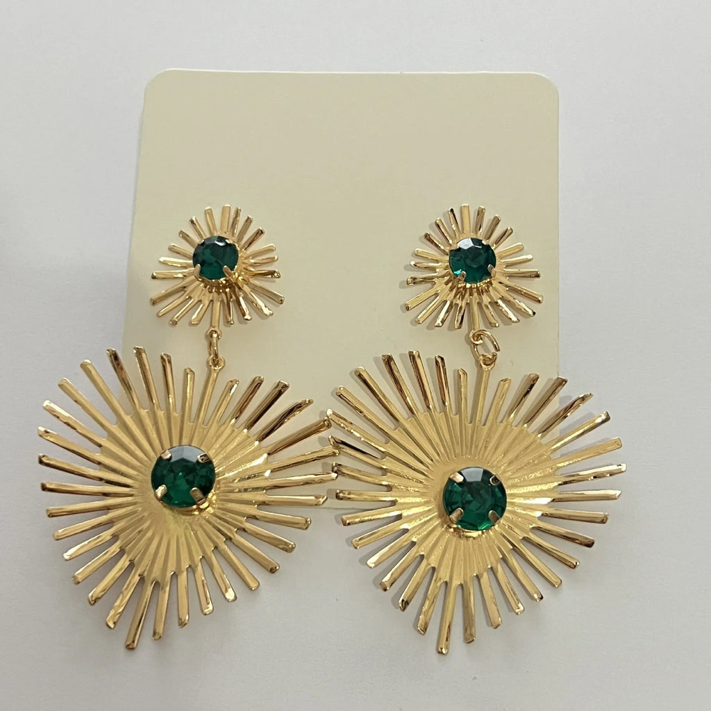 Bohemian sunflower heart-shaped earrings with rhinestones in gold finish on a white background