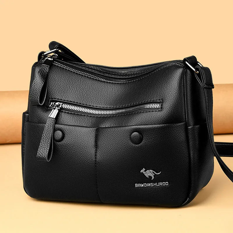 Soft PU leather women's crossbody bag in horizontal square design with multiple internal compartments