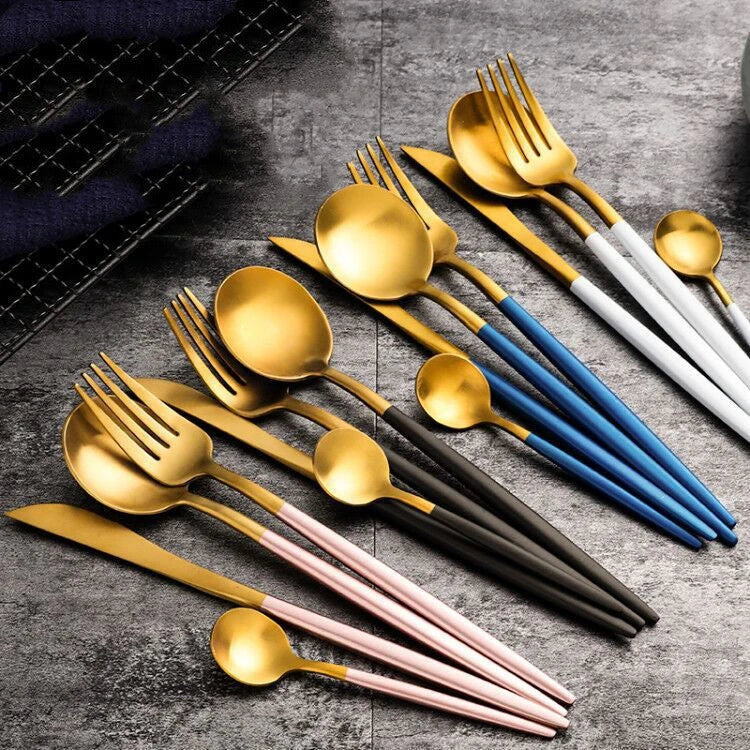 Premium stainless steel cutlery set with a mirror-polished finish, including coffee spoons, dessert spoons, main meal spoons, dessert forks, main forks, and chopsticks, presented in a stylish gift box.