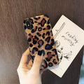 Colourful leopard print pattern on a black silicon and TPU iPhone case for XR or XS MAX.