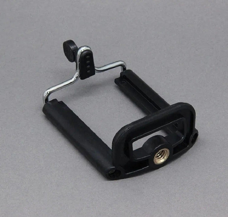 Black flexible octopus tripod with wrapped legs and spherical gimbal head for mounting a smartphone