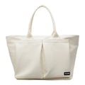 Lightweight solid colour PU shoulder bag shown in black, featuring an expandable design.