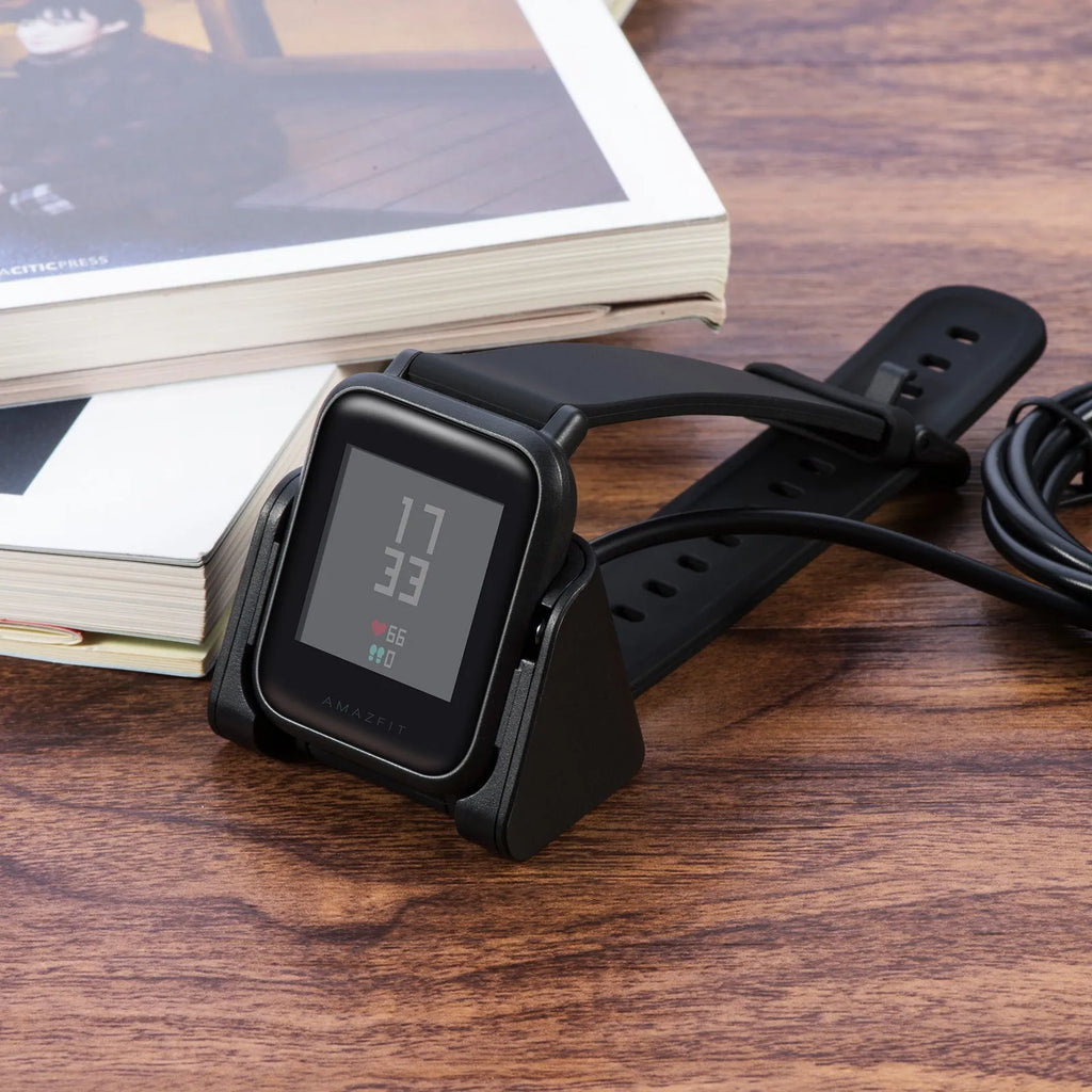 Black plastic charging cable for Youth Edition running smart watch, single replacement charger