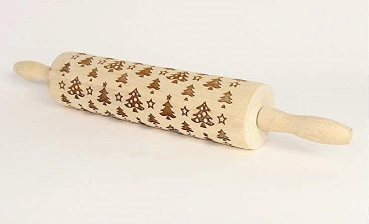 Personalized Christmas rolling pin with a variety of embossed holiday designs, including snowflakes, reindeer, and Merry Christmas patterns