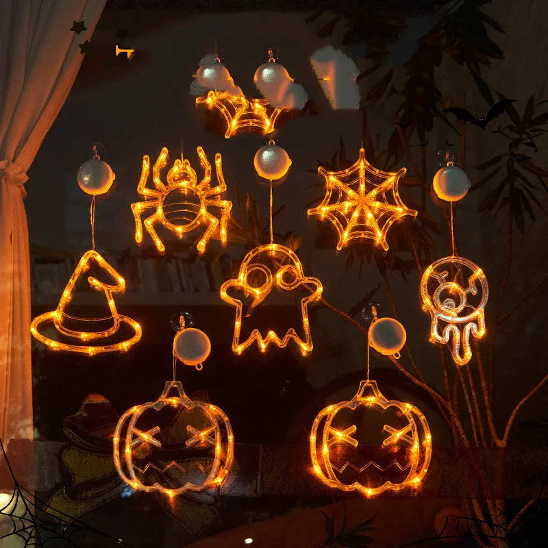 Halloween window hanging LED lights set with spider, pumpkin, and ghost shapes