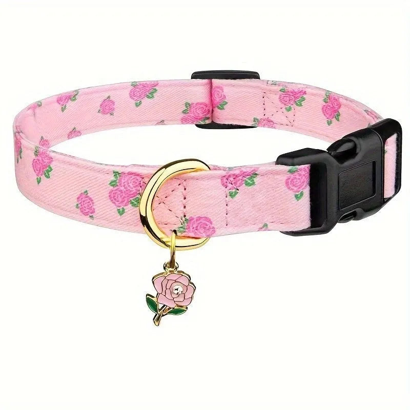 Adjustable polyester floral dog collar in Pink with buckle and slide adjuster on white background