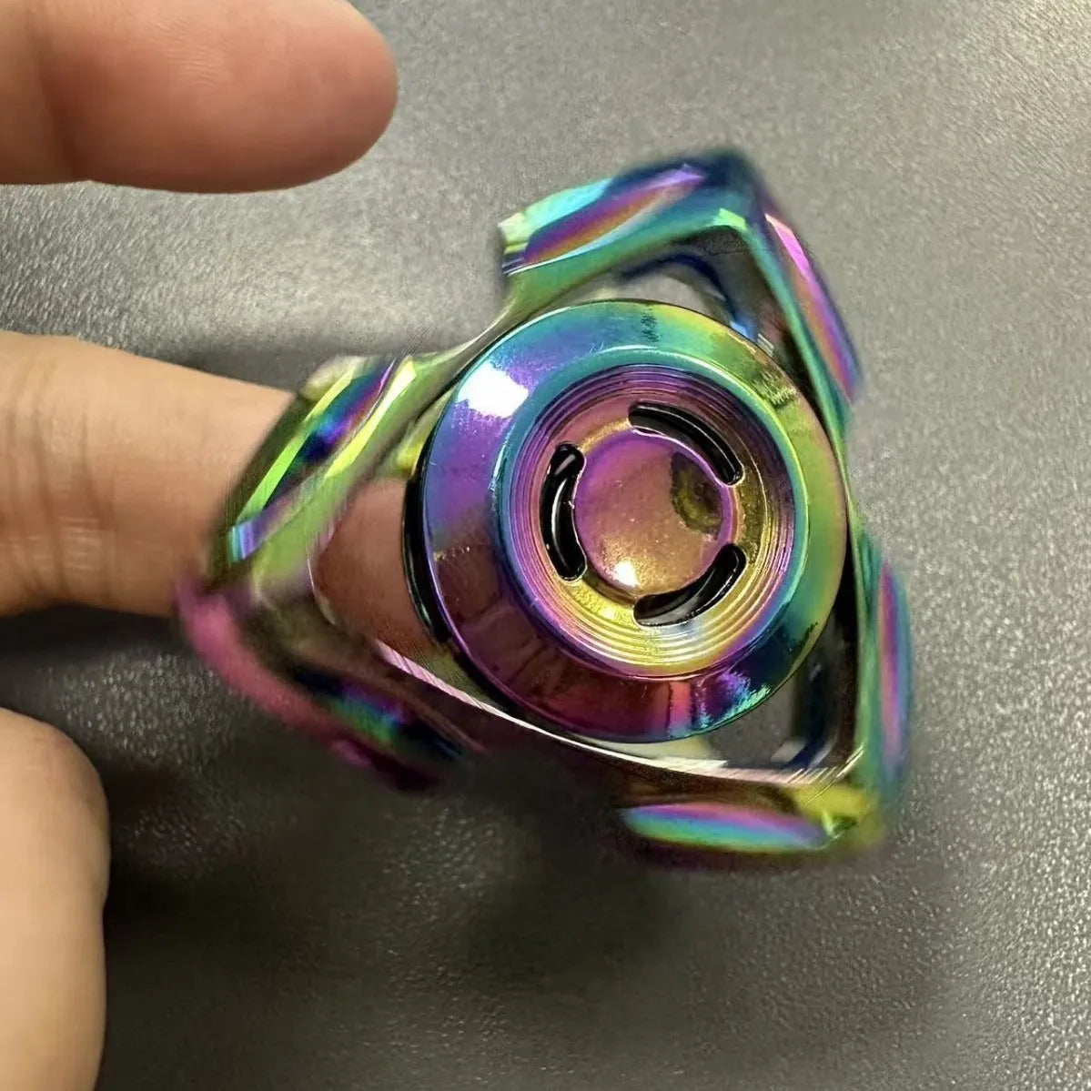 Alloy metal fingertip gyro decompression toy in colourful and silver options for youth ages 15-35
