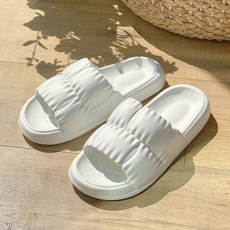 Stylish women's bathroom slides with soft, comfortable EVA soles and unique floral accents in a variety of vibrant colors