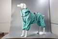 Dog wearing black cotton-padded polyester shell jacket with sports style design for winter warmth