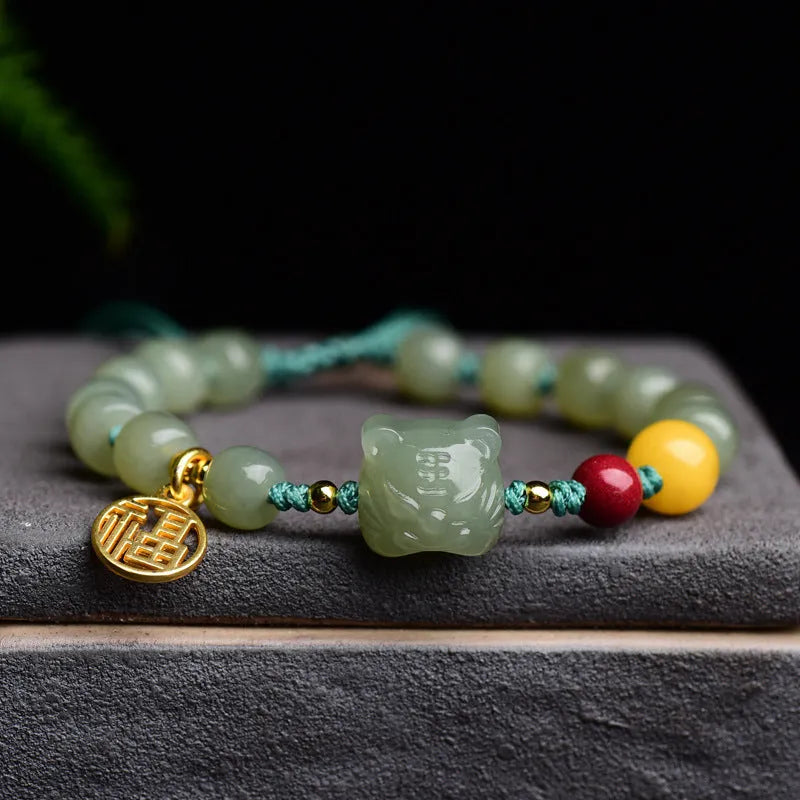 Natural Hetian jade and cinnabar beeswax bead bracelet with 5x7mm beads and Zodiac motifs