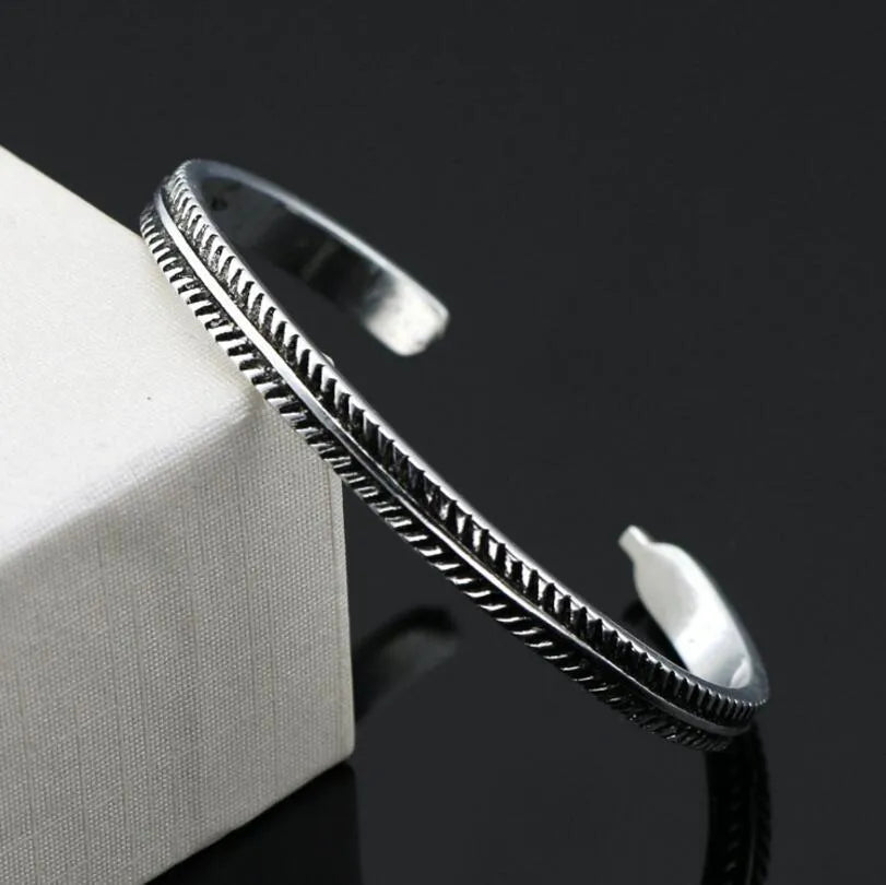 Women's Chinese retro style opening bracelet with fish motif and electroplated 925 silver finish