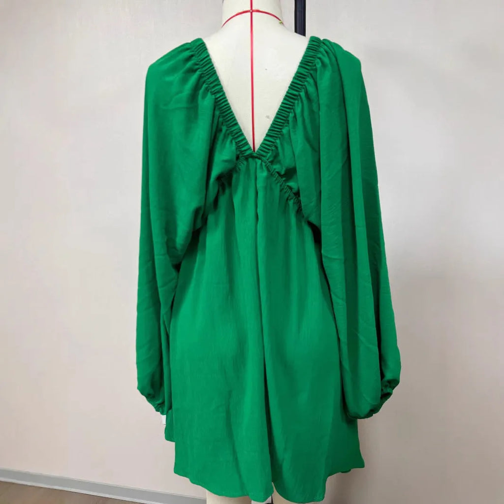 Women's V-neck dress with puff sleeves and flounced swing skirt in polyester fabric