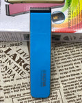 Electric hair clipper in multiple colours showing removable blade head and AA battery compartment.