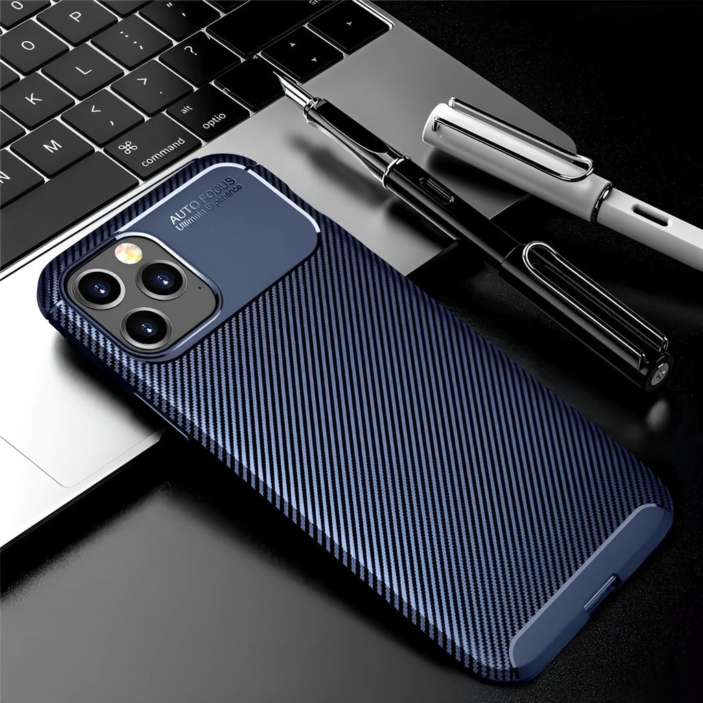 Black silicone protective case for iPhone on a wooden table.