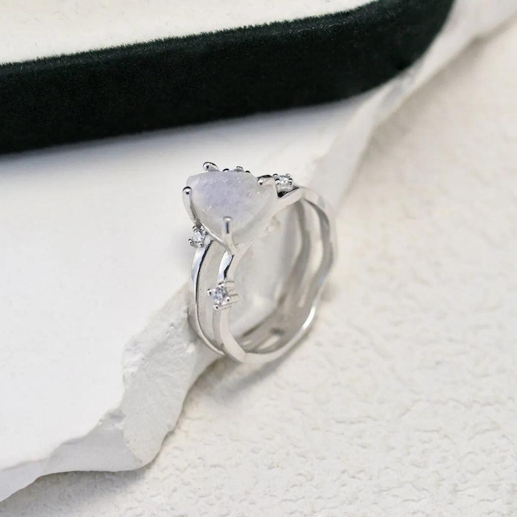 S925 silver irregular triangle ring with a moonstone, shown in rose gold, white gold, and yellow gold finishes.