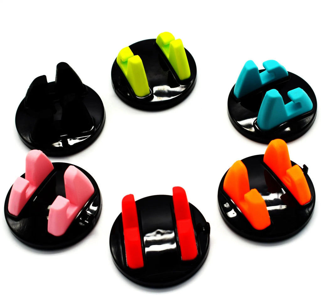Mini dashboard car phone holder in black with 360-degree rotation, PC and silicone build, universal phone stand.