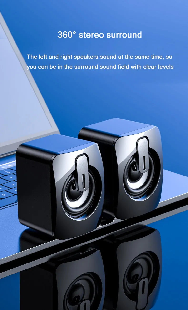 Pair of small black and white desktop speakers with USB power, 3.5mm aux, dual 4Ω 3W horns and bass boost
