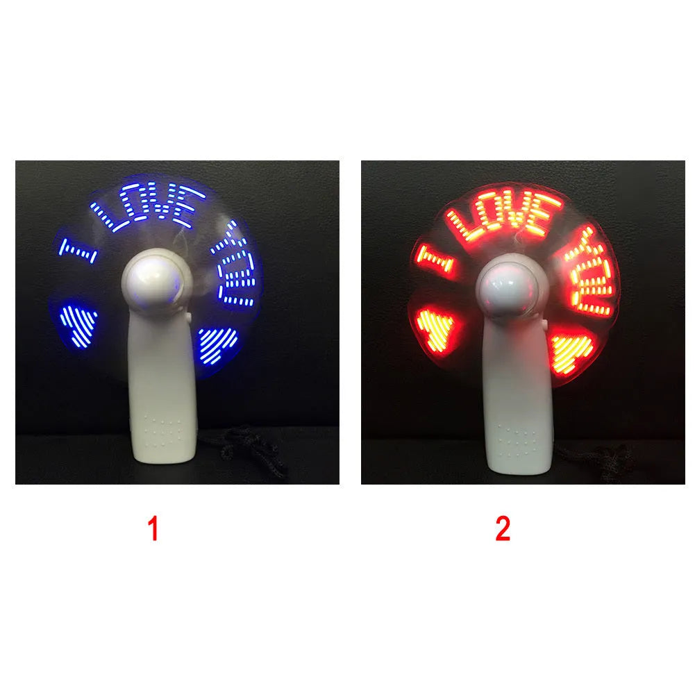 White handheld mini fan with blue and red LED 'I love you' flashing pattern on display.