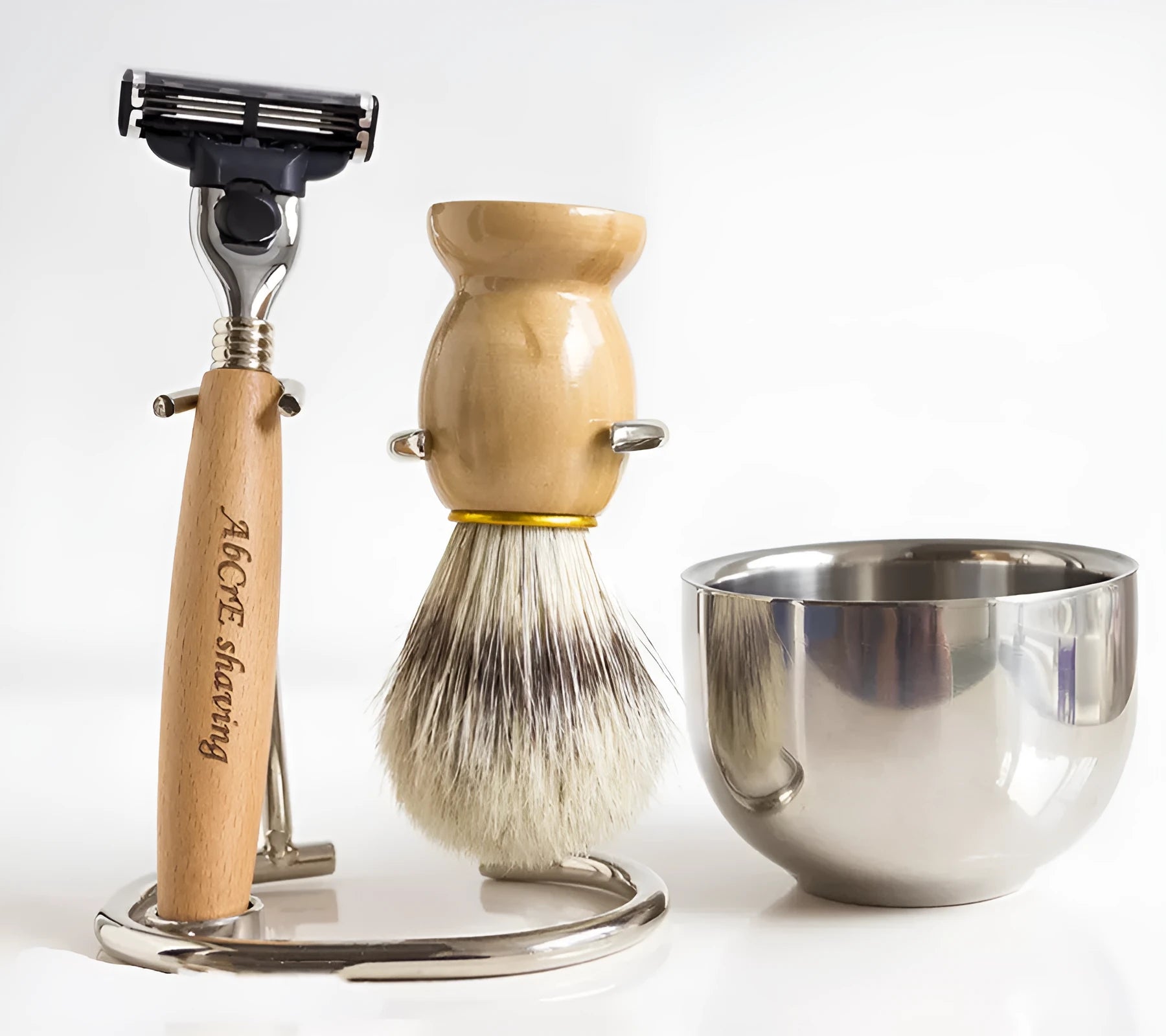 Men's manual shaving set with beech handle razor, bristle brush, stainless steel soap bowl, and metal stand
