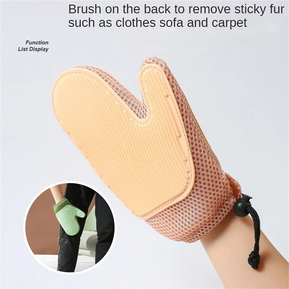 Dark blue pet hair removal glove for grooming dogs and cats on a fabric sofa.