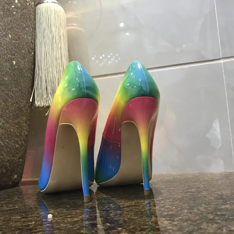 Rainbow patent leather pointed toe stiletto high heel shoe with thin heel.
