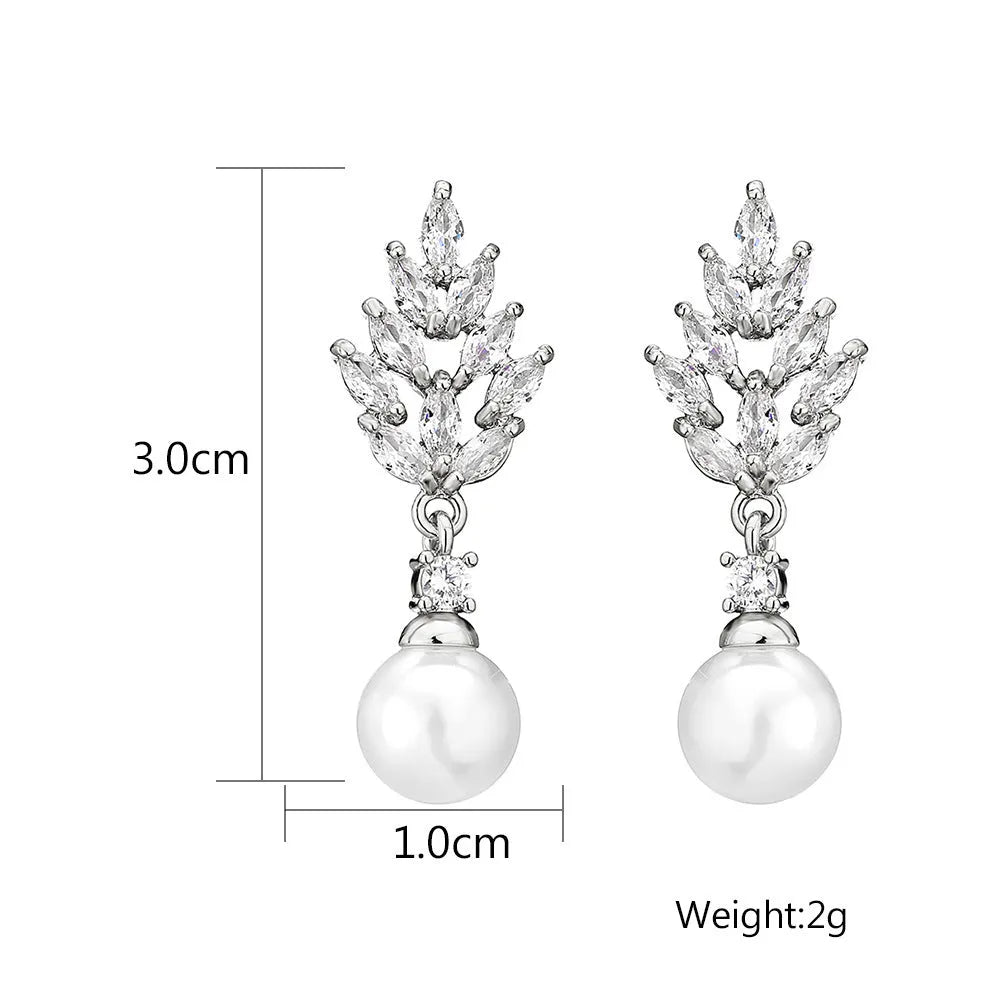 Geometric flower earrings with micro inlaid zircon and pearl details in gold, platinum, or rose gold finishes