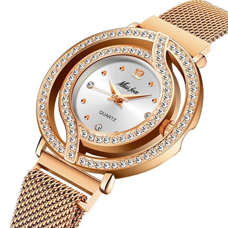Quartz wrist watch with 32mm round alloy case, Milano mesh stainless steel strap, and magnet closure in golden blue dial option