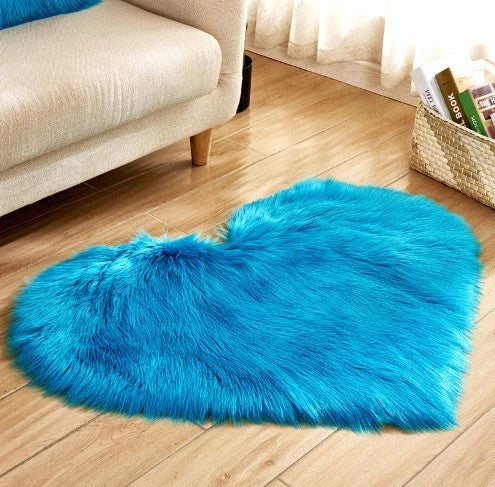 Soft and plush heart-shaped rug in various colors, perfect for cozy home decor