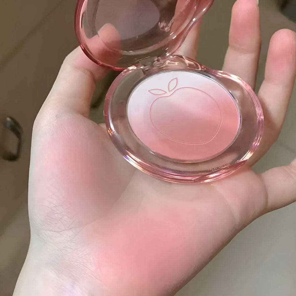 Bubble gradient design powder blush compact open, showing six shade options for dry skin.