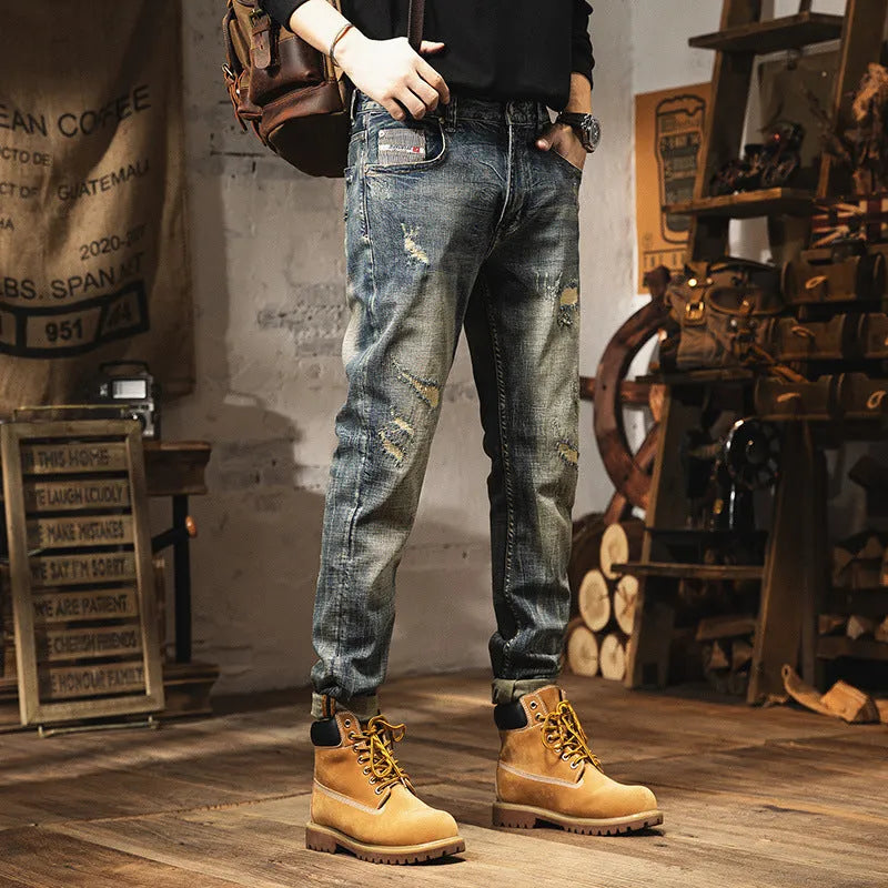 Men's vintage blue loose straight-leg jeans with fleece lining and a drawstring waist closure.