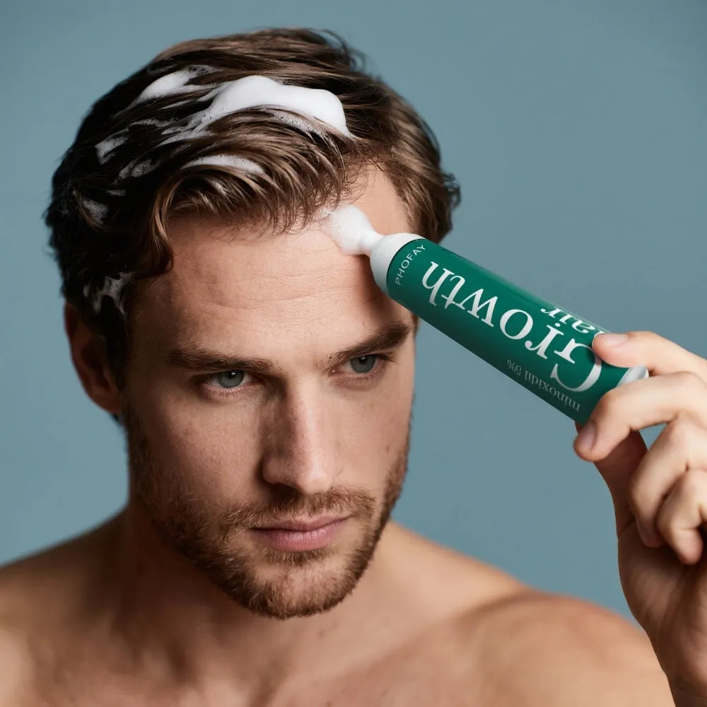 60ml canister of minoxidil anti-hair loss mousse foam with applicator.