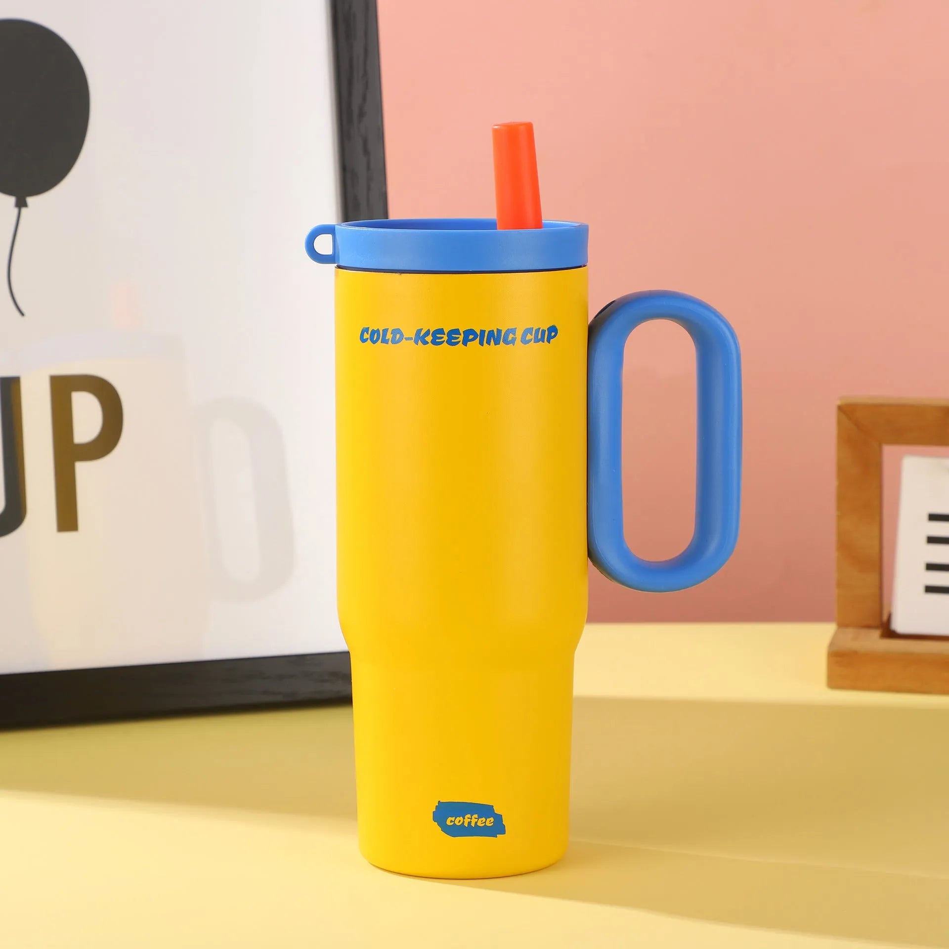 Large insulated portable straw cup with carry handle and straw in multiple colour options.
