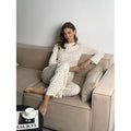 White floral print women's home wear suit with bell sleeves and wide-leg trousers