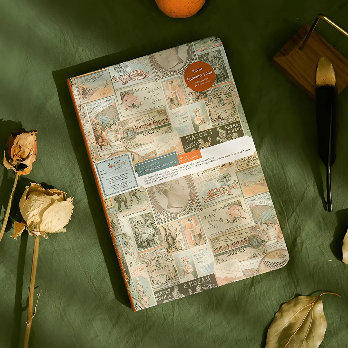 A5 kraft paper notebook with European retro illustrations open to show colour pages