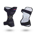 Black knee booster with carbon steel spring and Velcro straps on a neutral background