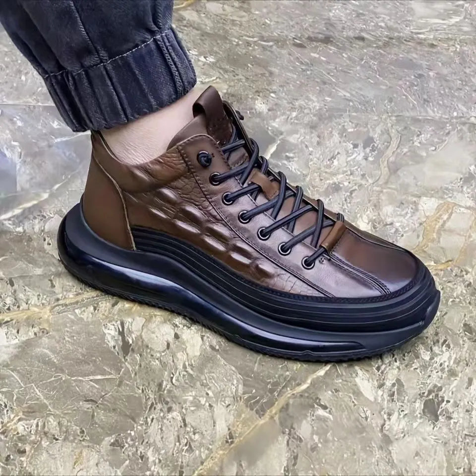 Men's high-top warm air cushion shoes in black with cowhide upper, rubber sole, elastic band, and carved detailing